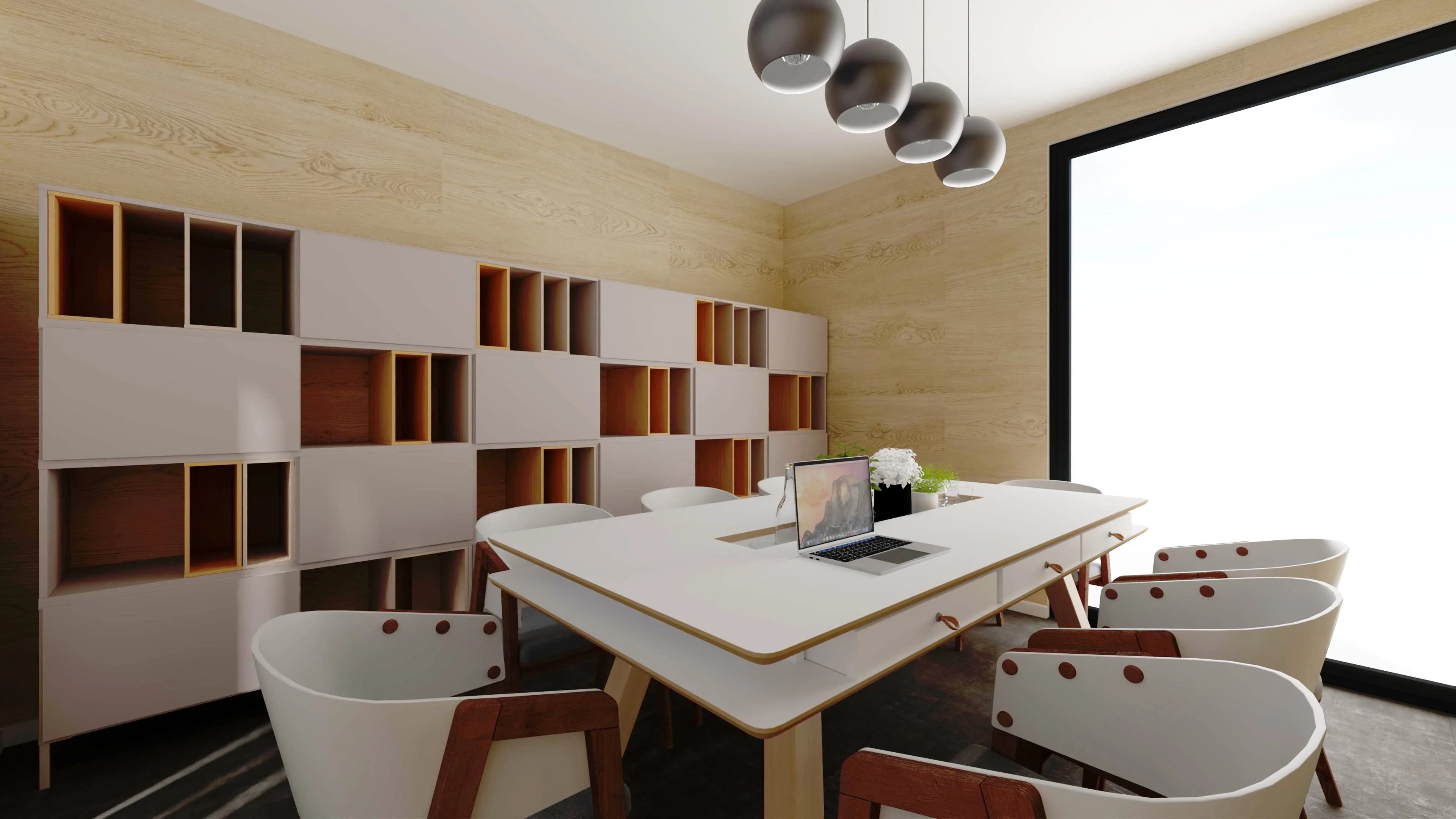 Niewielka salka konferencyjna z dużym stołem i tv