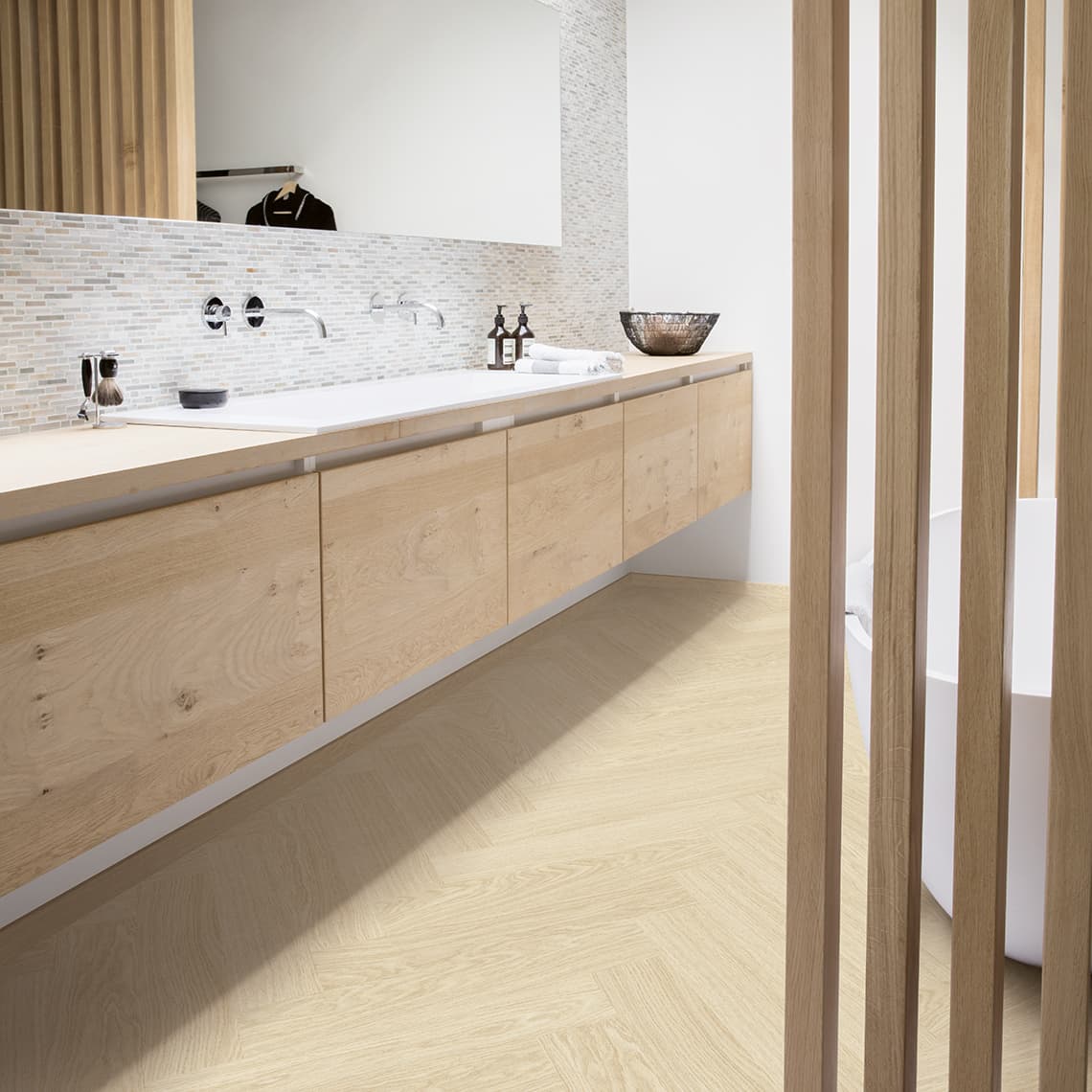 Podłoga winylowa Quick Step Ciro ze zintegrowanym podkładem Dąb polarny AVHBU40361 jodełka aranżacja