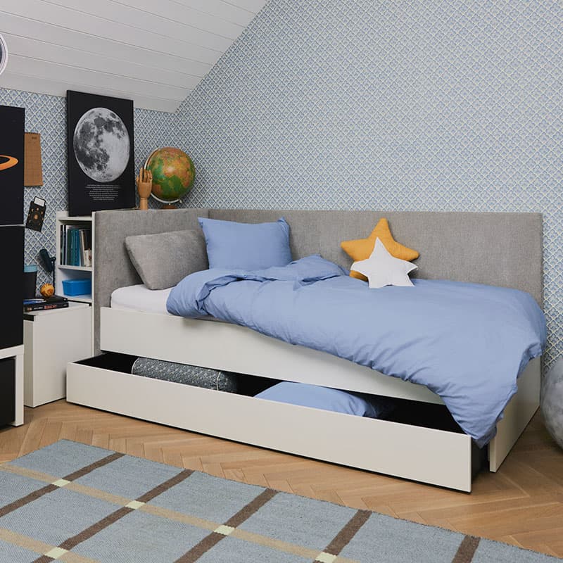 Left upholstered bed with lift-up frame and cover panel Young Users Next arrangement